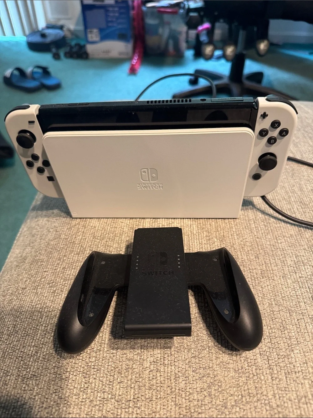 Nintendo Switch OLED White Console with Black Joy-Con Grip